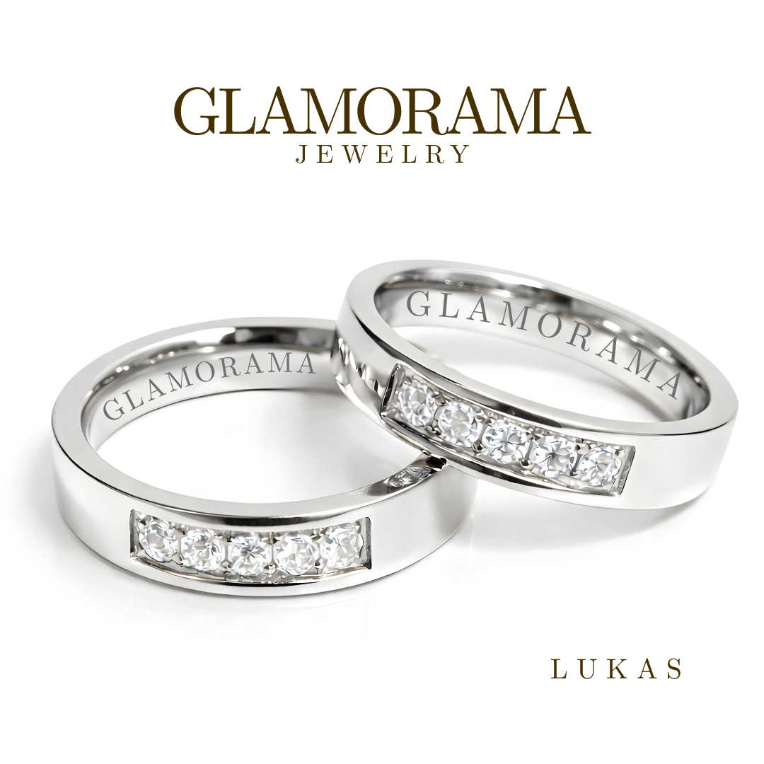Two silver rings with diamond accents from Glamorama Jewelry on a white background.