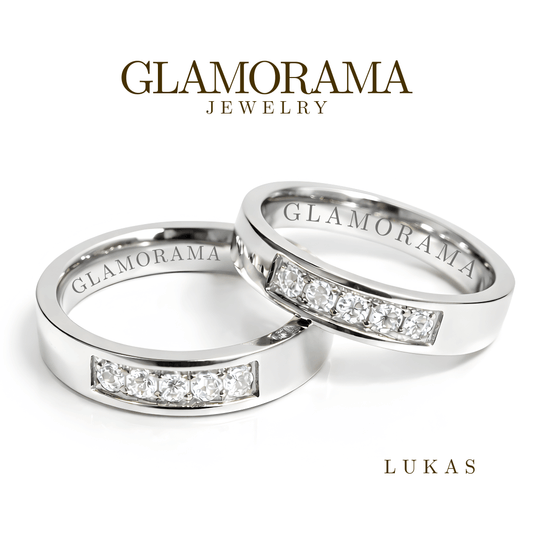 Two silver rings with diamond accents from Glamorama Jewelry on a white background.