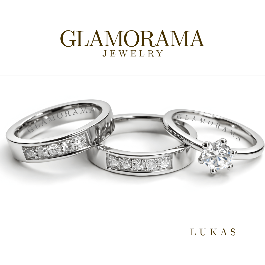 Glamorama jewelry with three silver rings on a white background