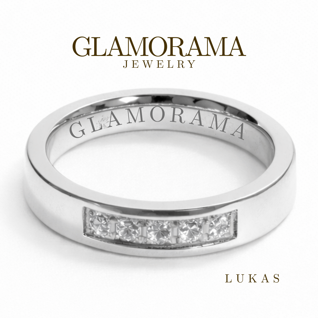 Silver ring with embedded diamonds from Glamorama Jewelry on a white background